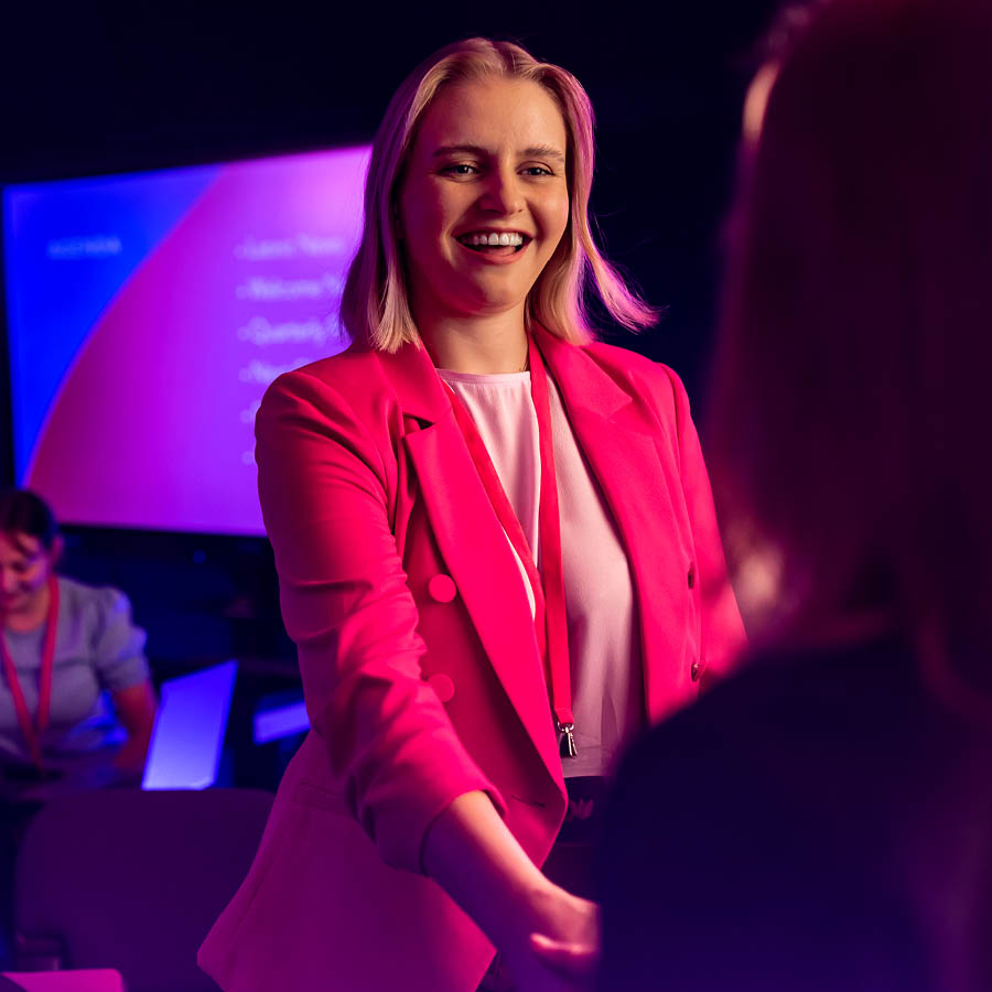 Photograph of a nursing student Zoe Hope working with a hololens heart